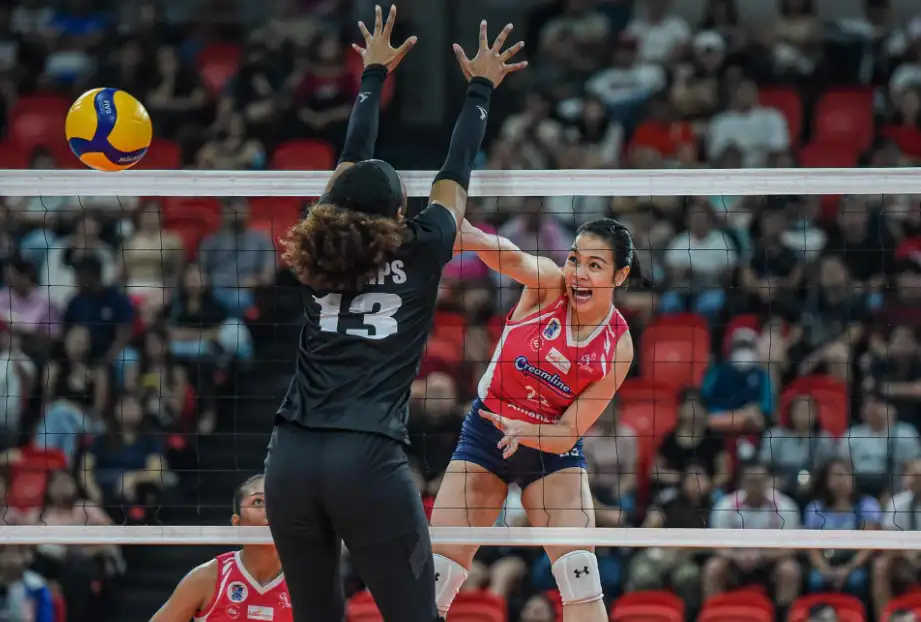 Jema Galanza of Creamline Powers over MJ Phillips of Petro Gazz